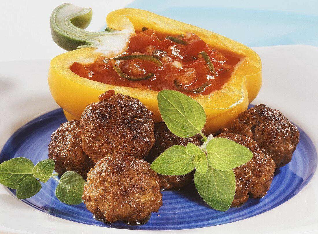Meatballs with chili dip in pepper half