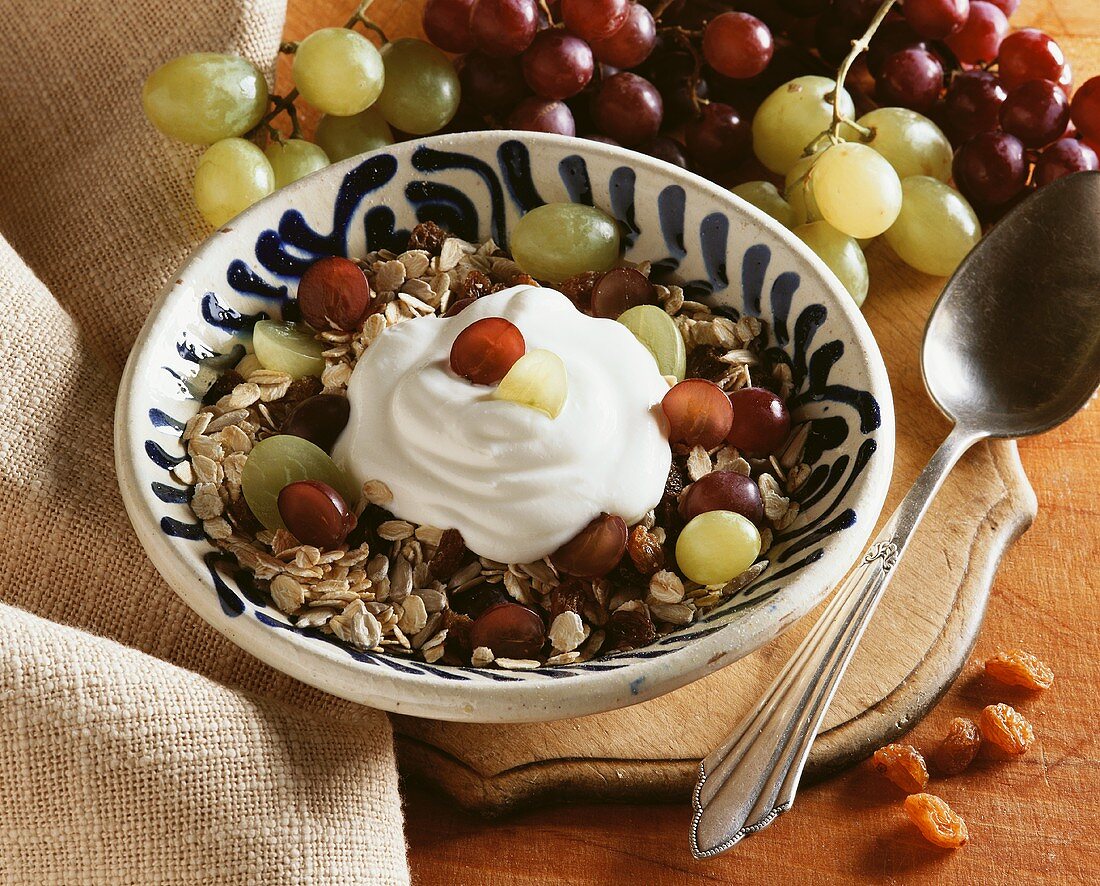 Muesli with grapes and natural yoghurt