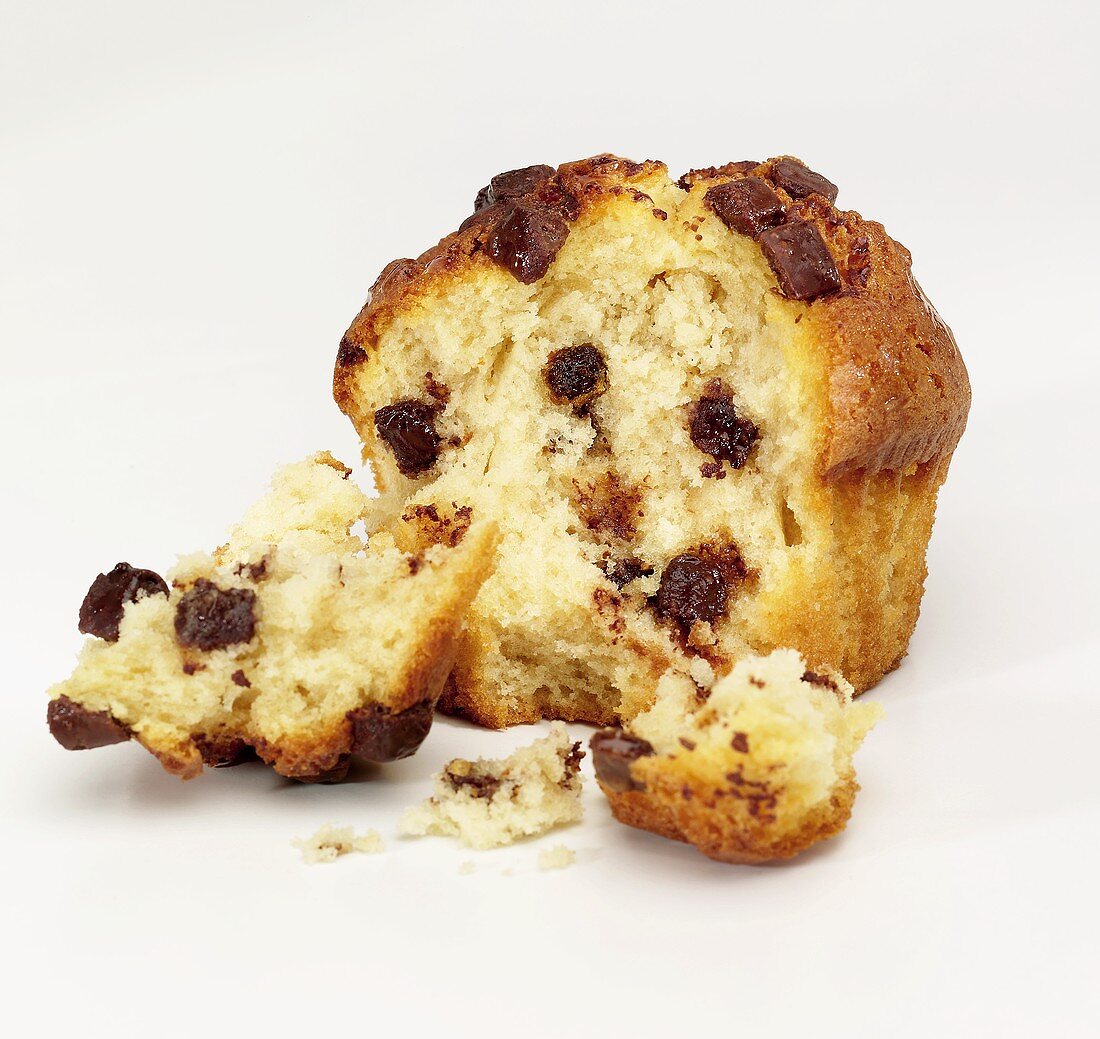 A chocolate chip muffin, broken open