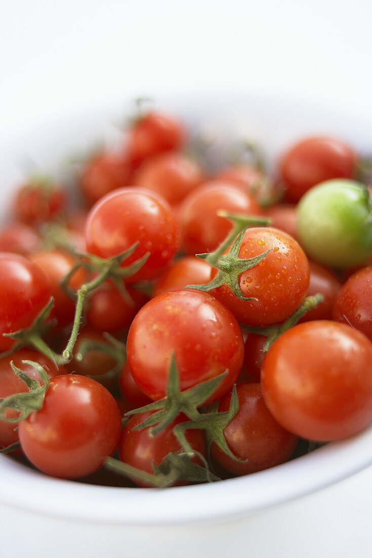 Cocktail tomatoes in small bowl