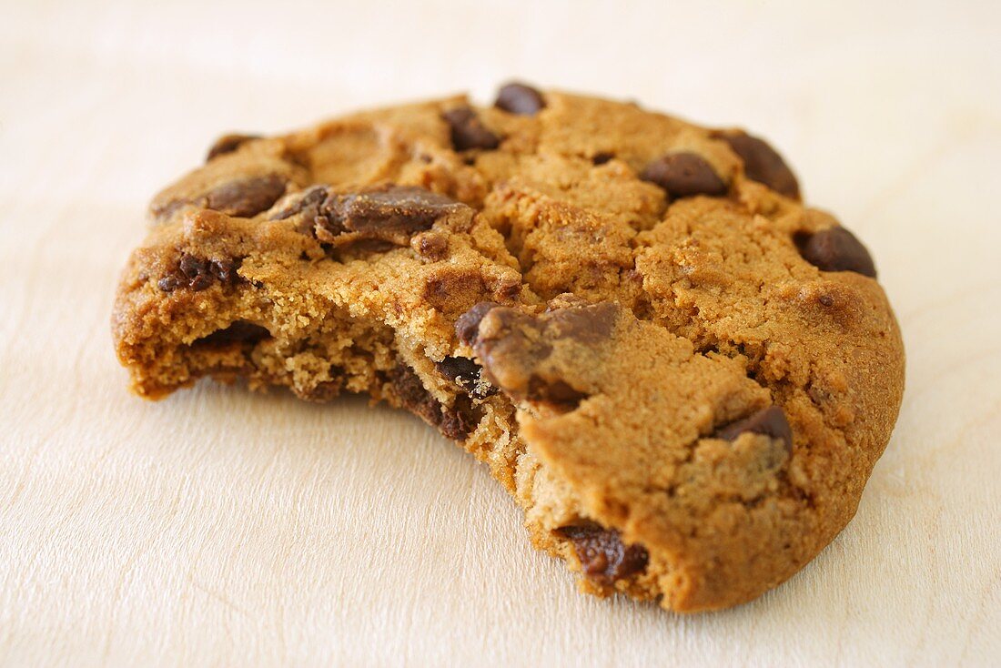 Chocolate chip cookie with a bite taken