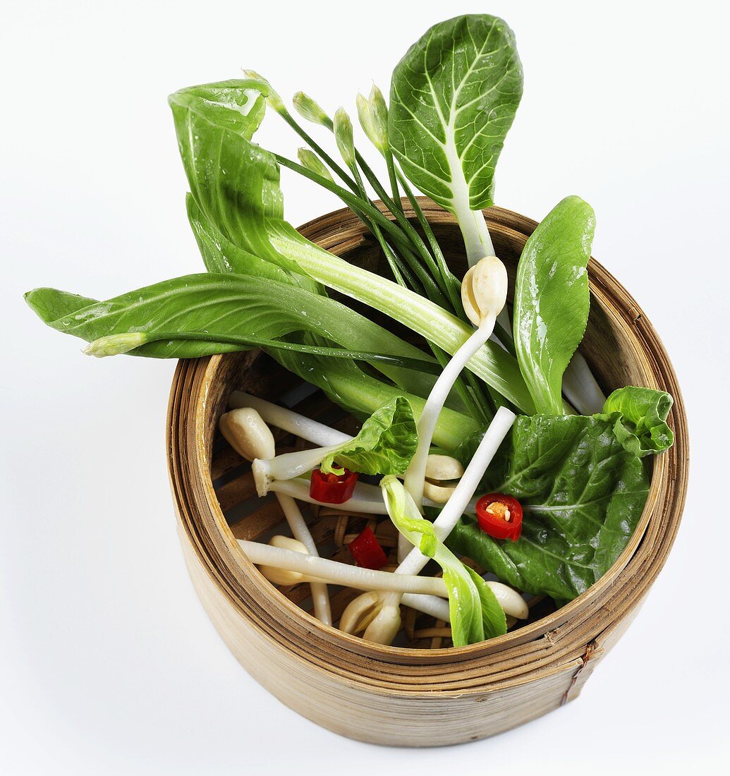 Asian vegetables in steaming basket