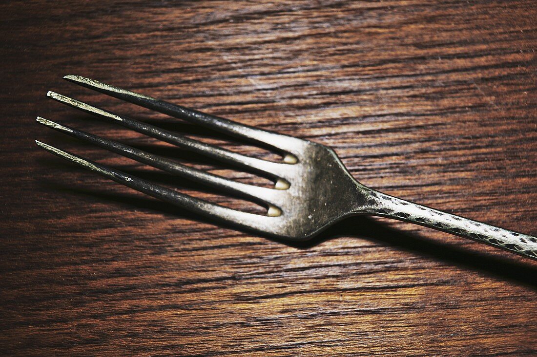 Fork on a wooden table