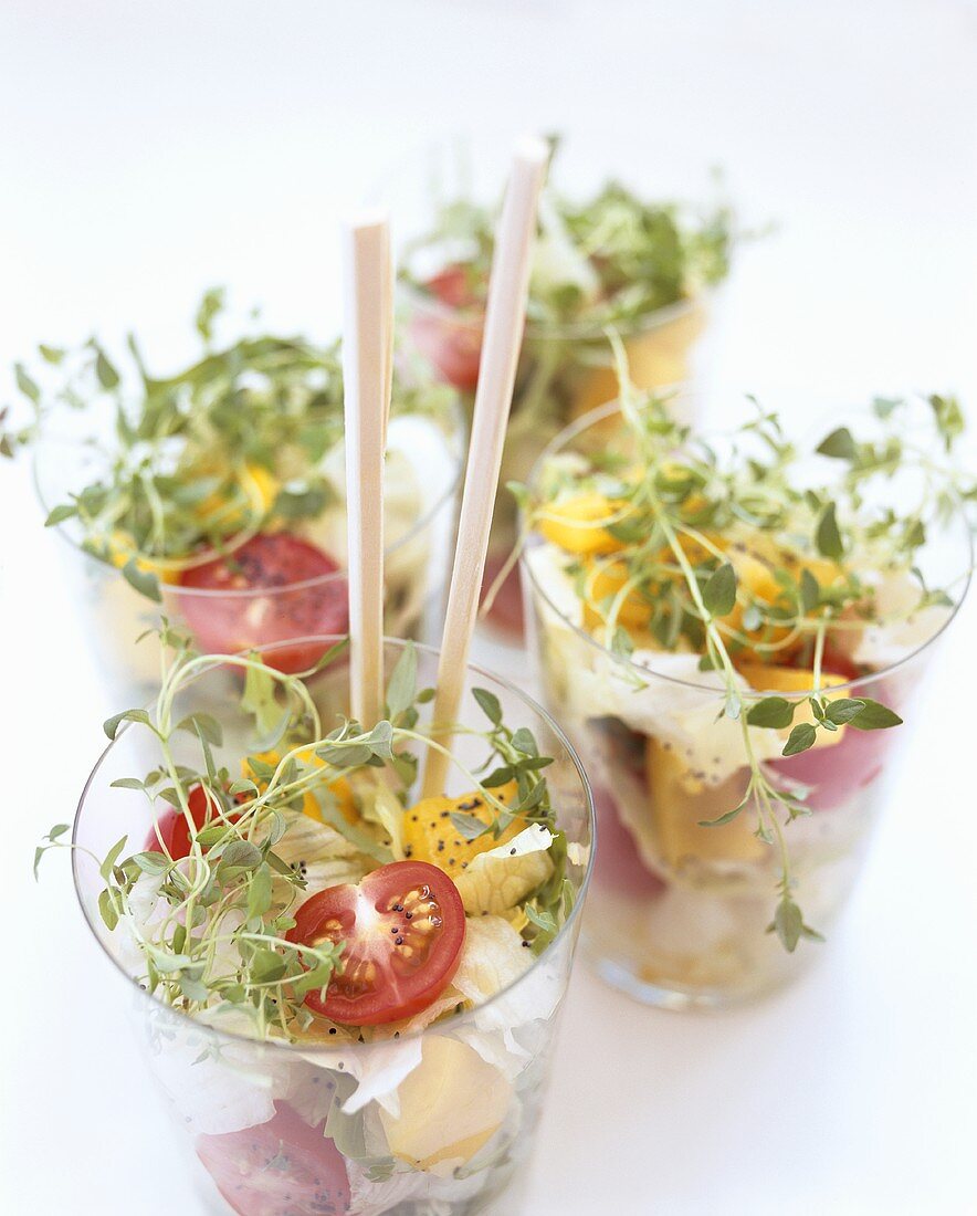 Mixed salad in glasses