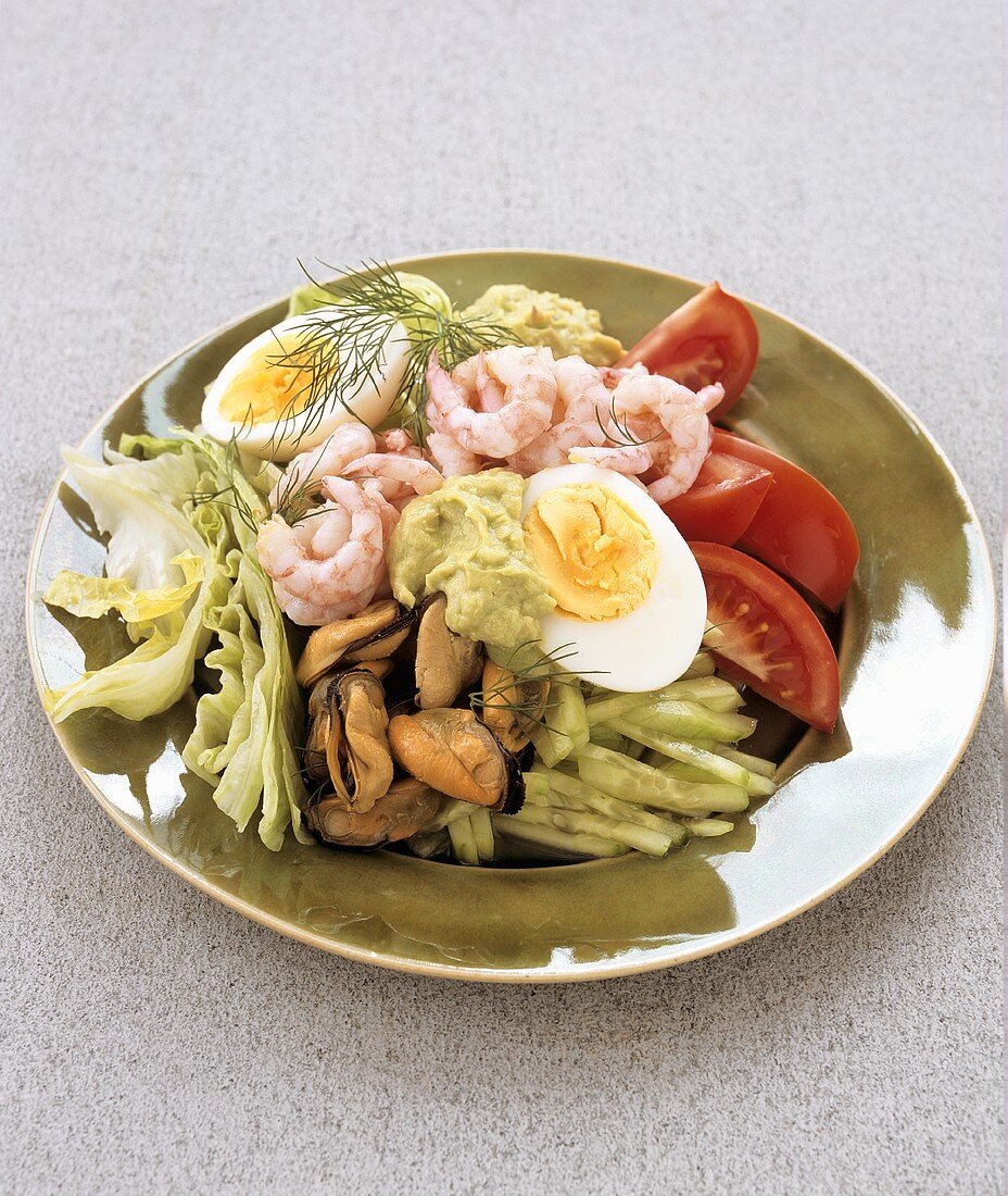 Plate of salad with seafood