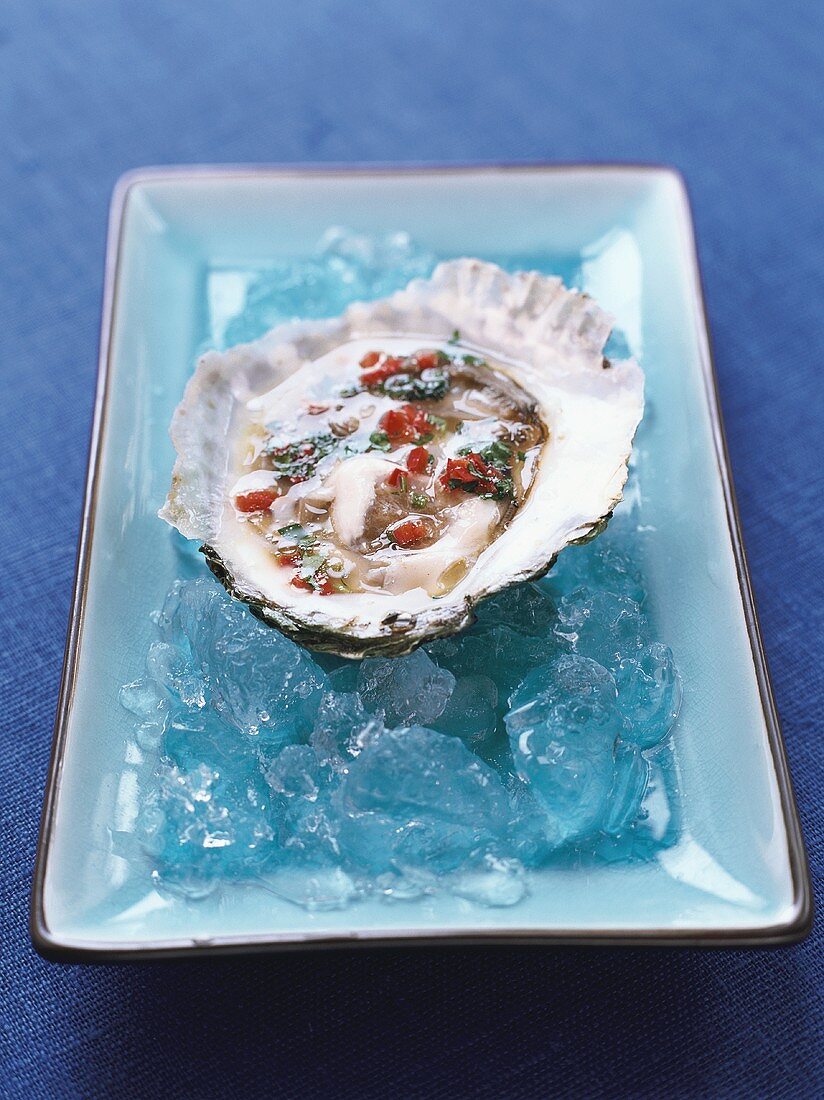Opened oyster on ice