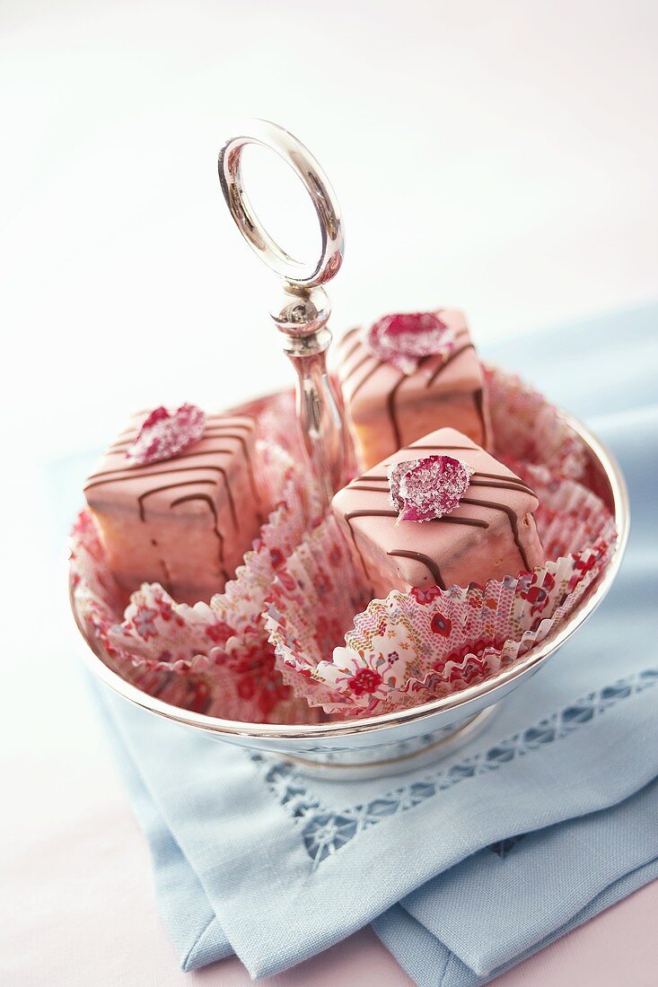 Petit fours with candied rose petals