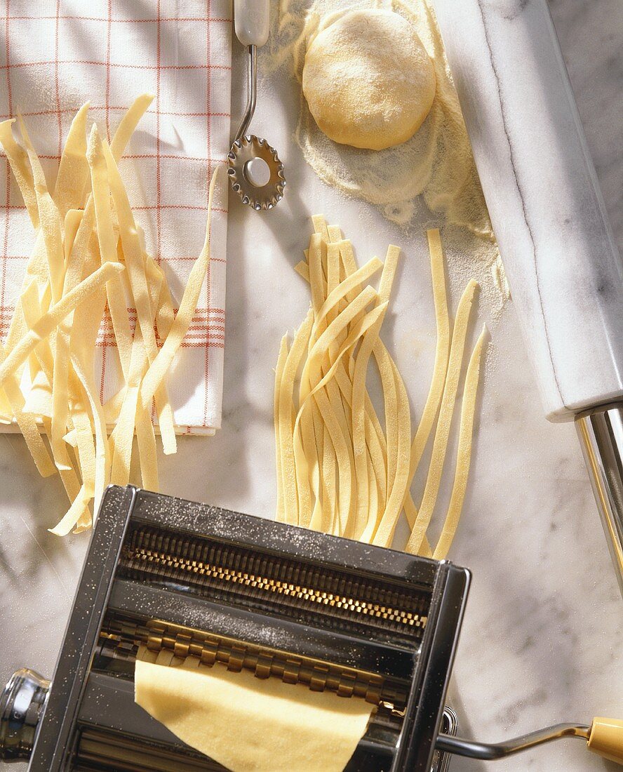 Pasta maker with home-made ribbon pasta