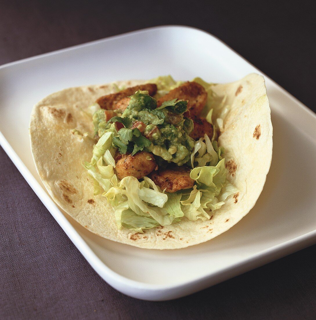 Taco with chicken and avocado puree