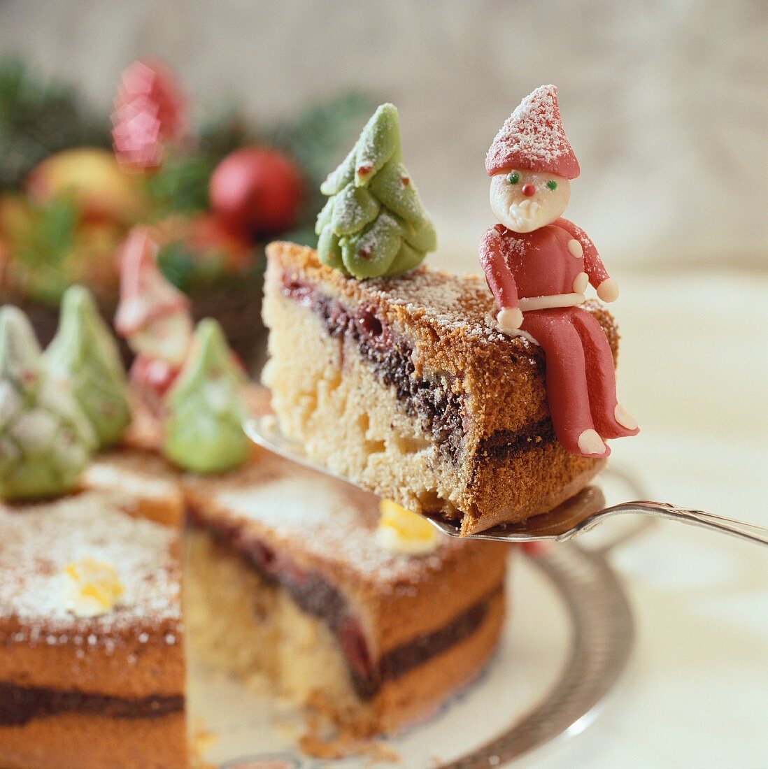 Carrot cake with marzipan figures for Christmas
