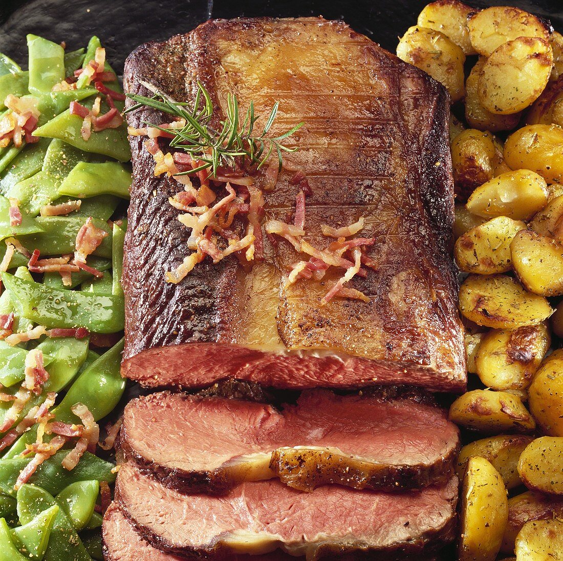 Roast beef with beans and roast potatoes