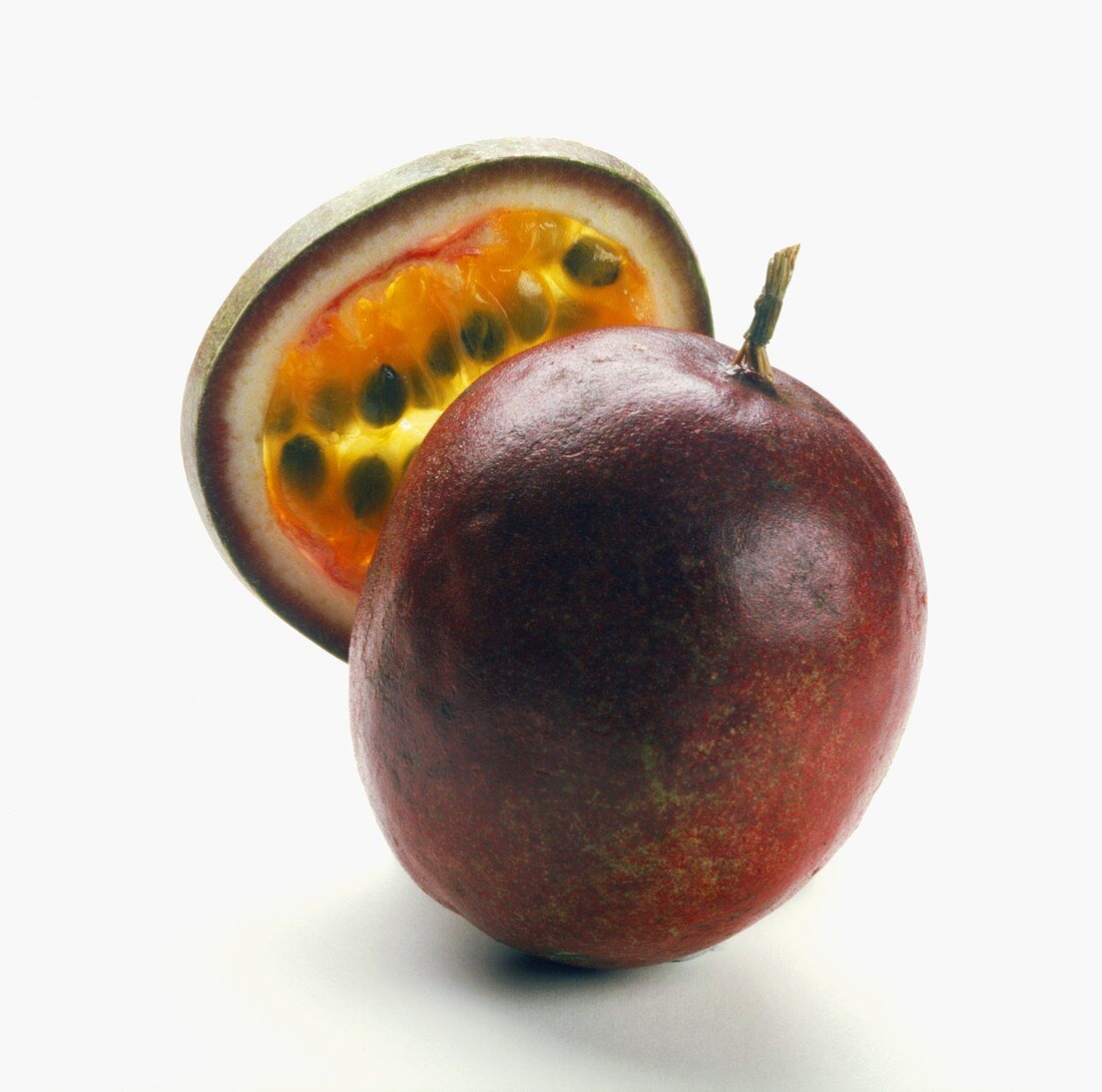 A passion fruit and a single slice