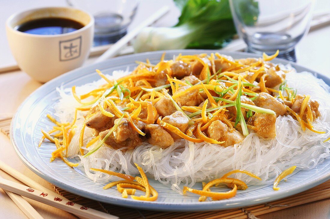Chicken with orange zest and glass noodles