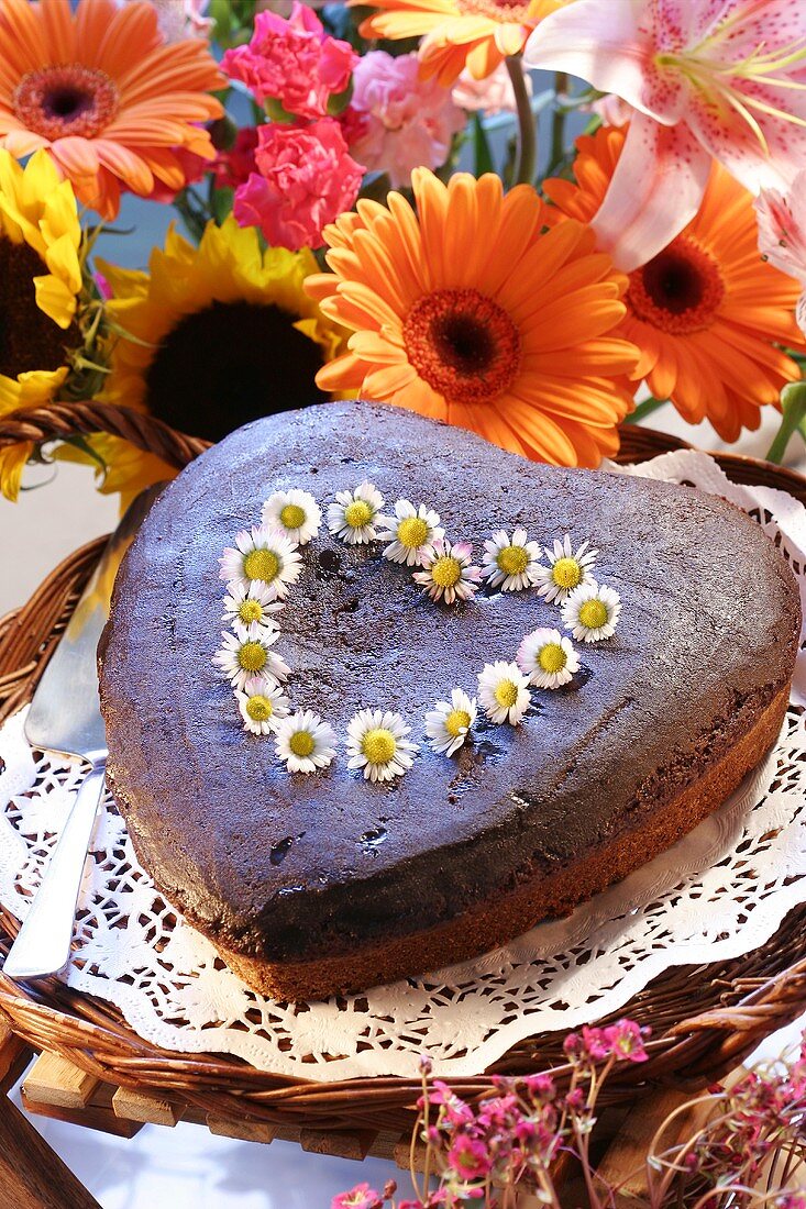 Chocolate heart with daisies