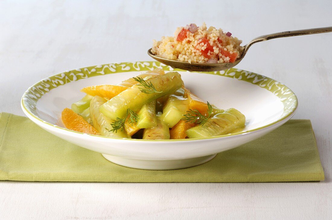 Braised cucumber with oranges and couscous