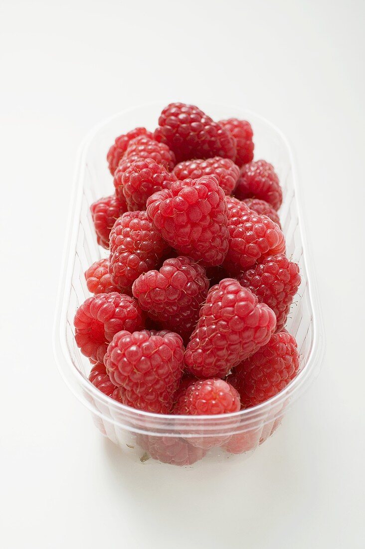 Raspberries in a plastic punnet