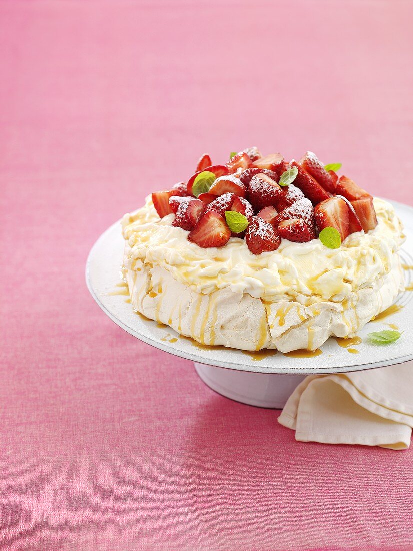 Pavlova (Australian meringue dessert) with strawberries