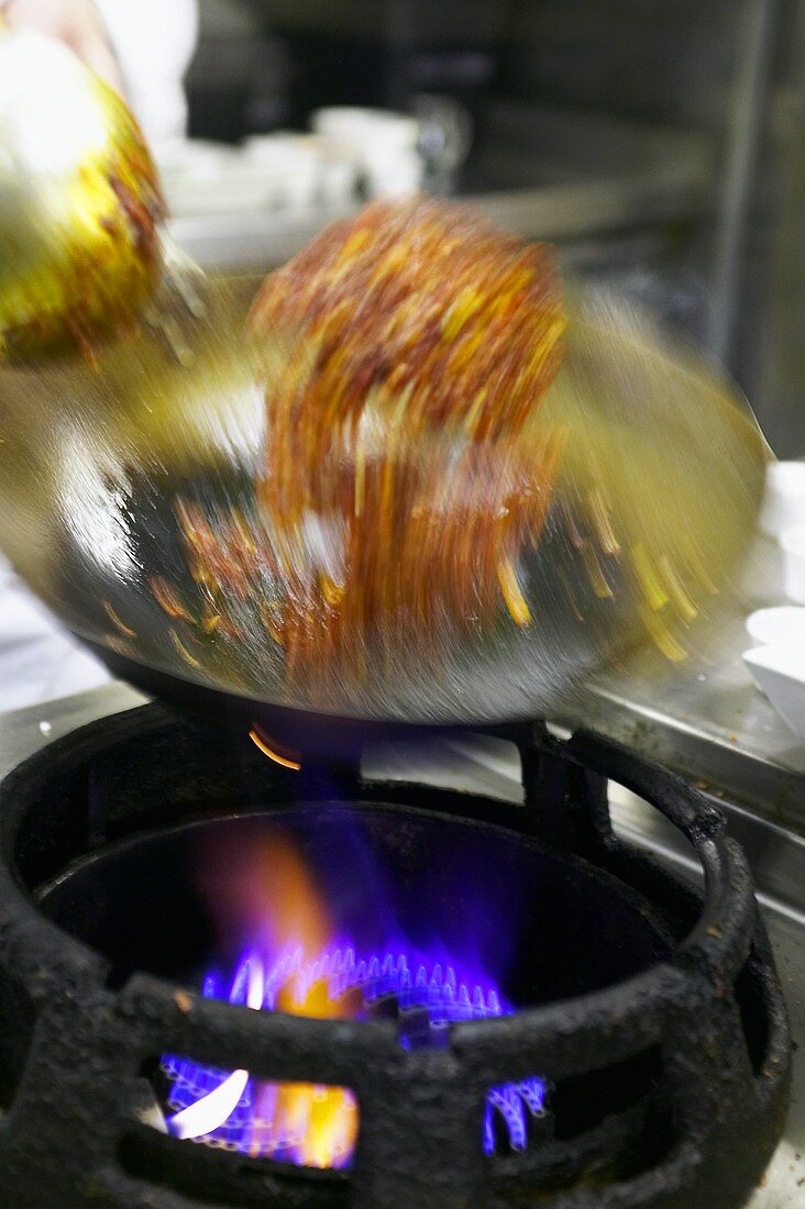 Cooking with a wok