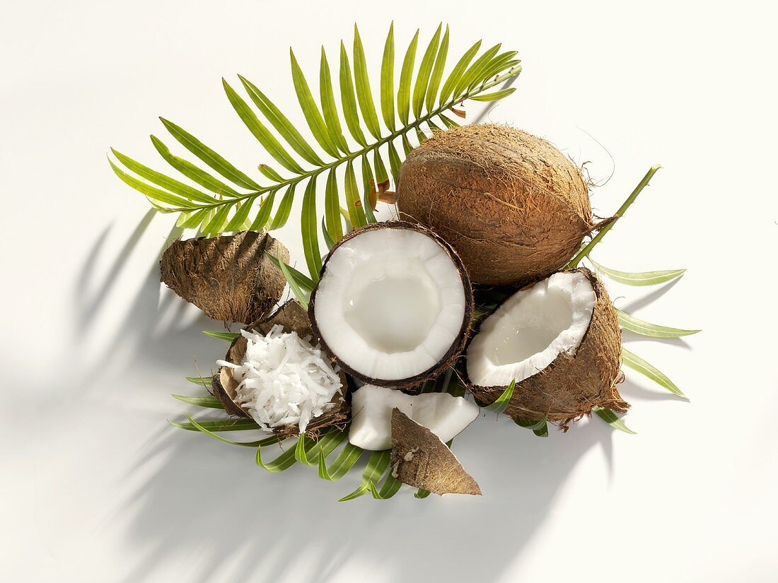 Whole and halved coconut and grated coconut