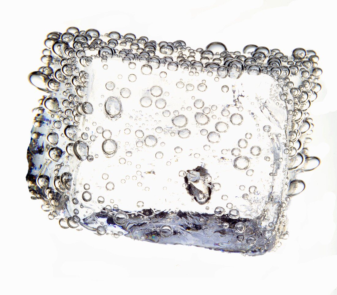 An ice cube with air bubbles