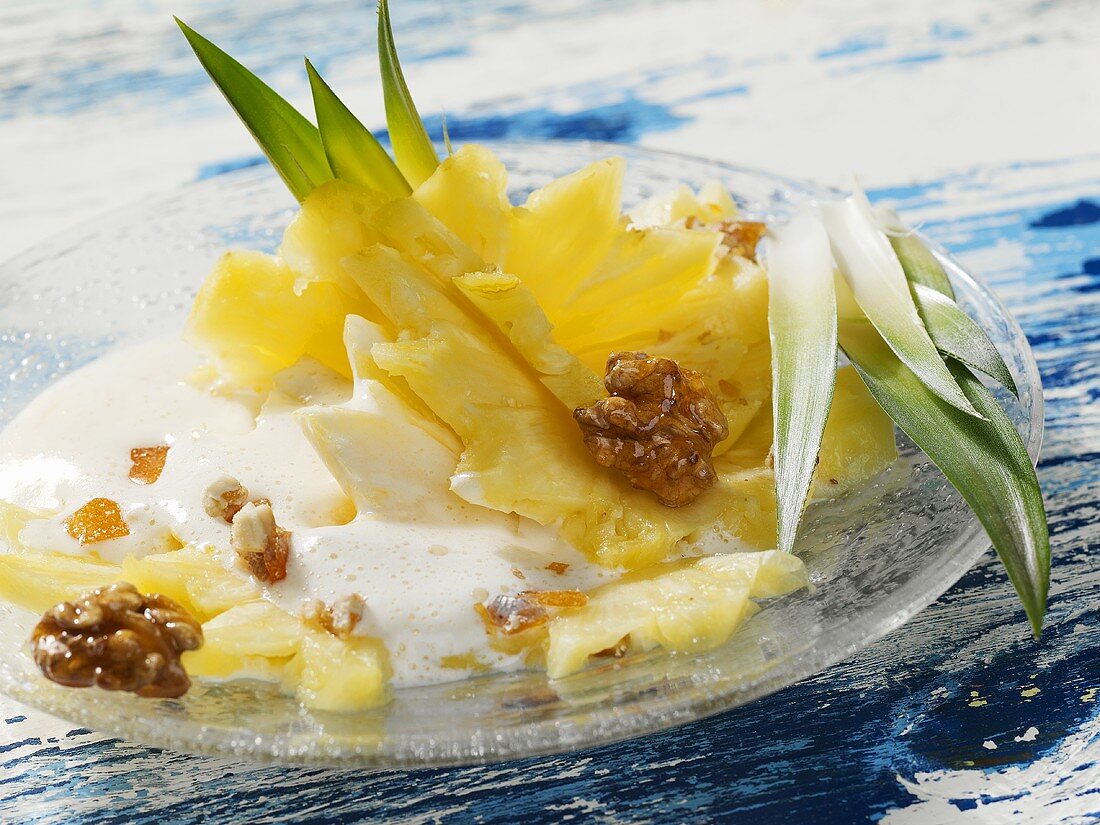 Pineapple salad with walnuts and almond foam