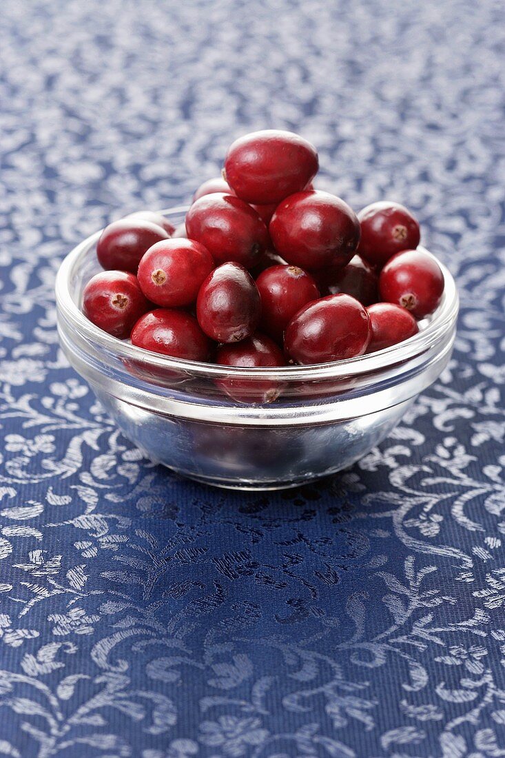 Cranberries in a small glass dish