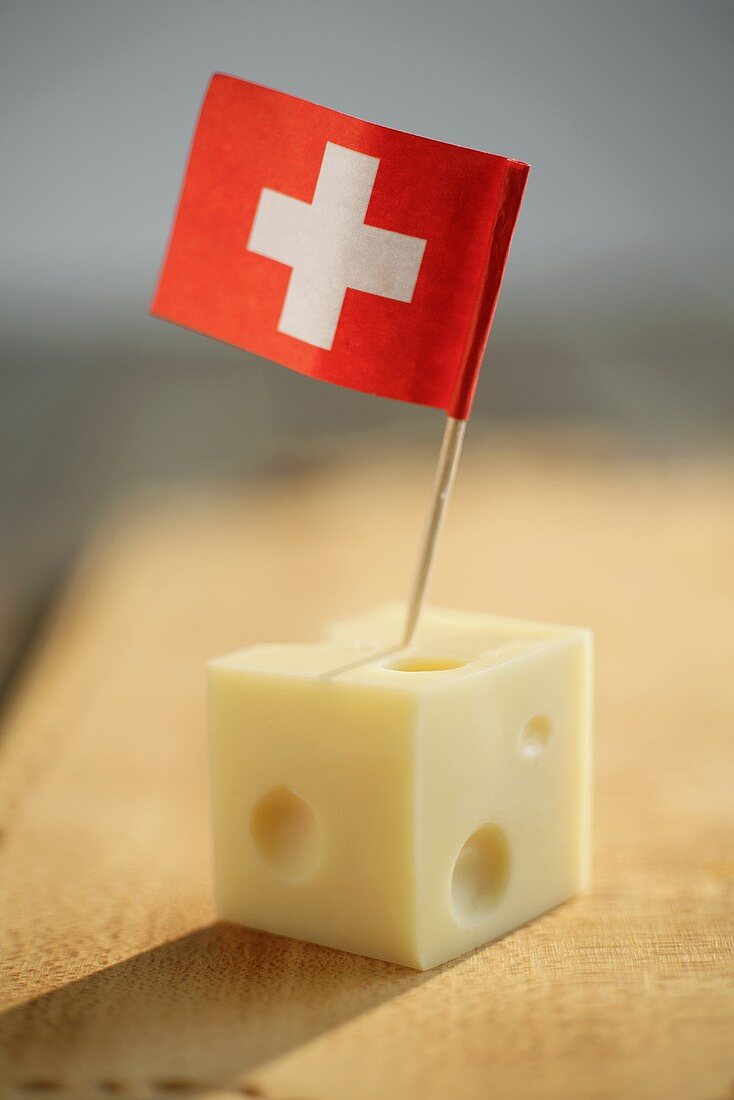 Cube of Emmental cheese with Swiss flag