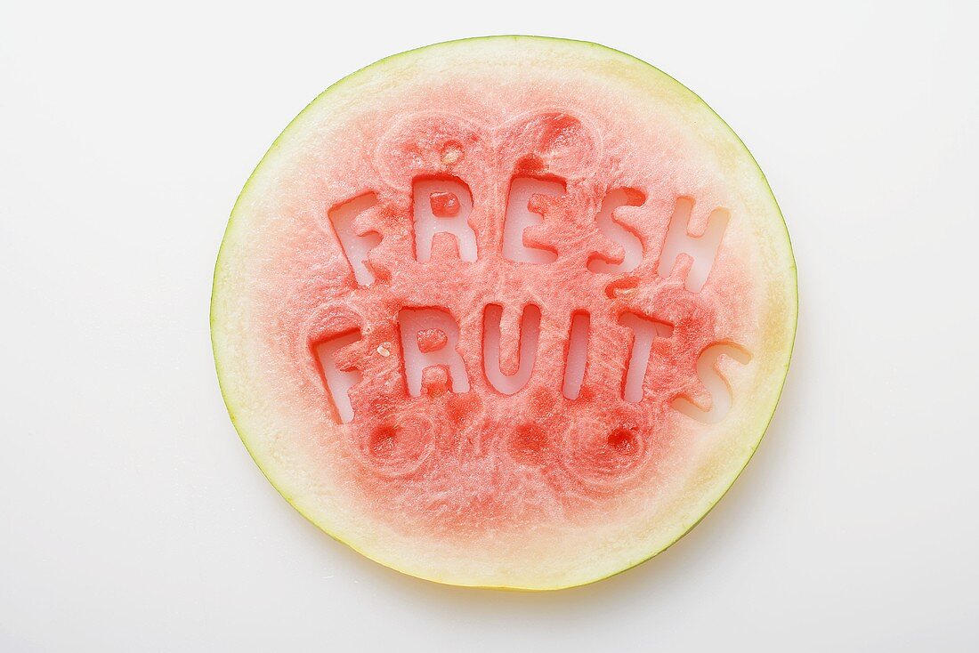 Slice of watermelon with the words 'Fresh Fruits'