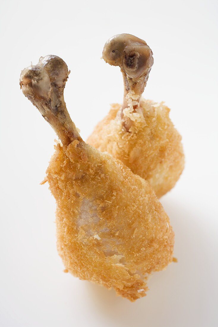 Two breaded chicken legs