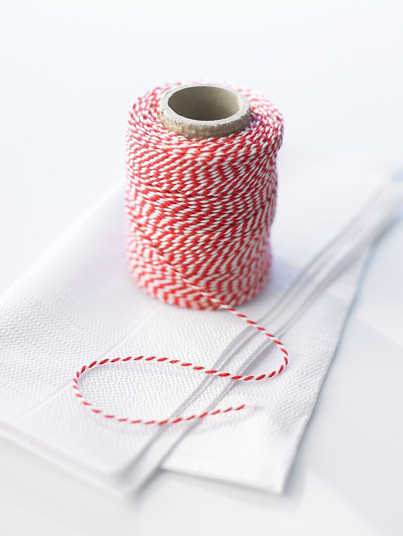 A ball of kitchen string on paper napkin