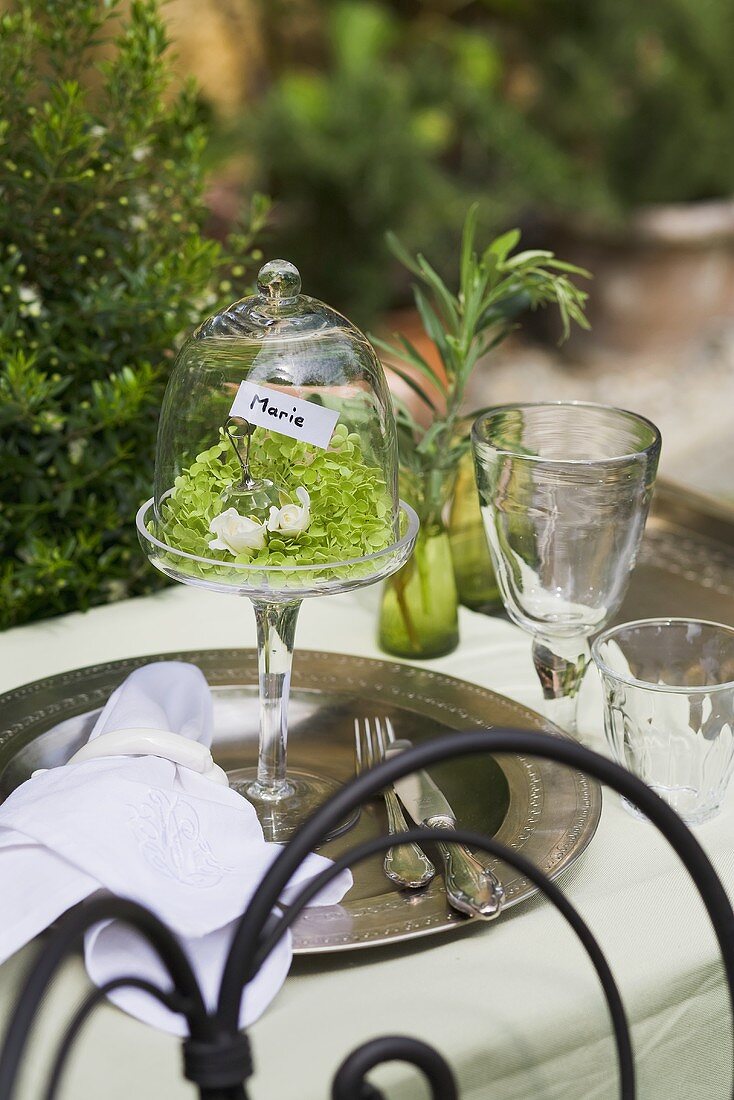 Place-setting with place card in garden