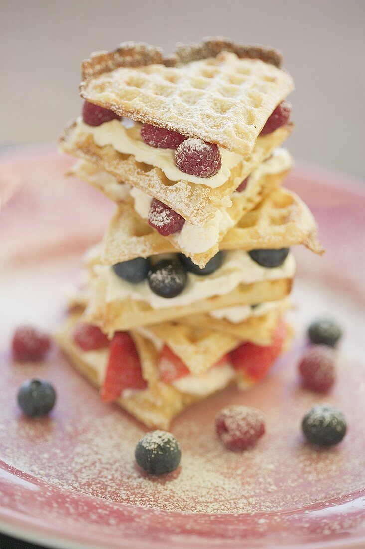 A tower of waffles and berries