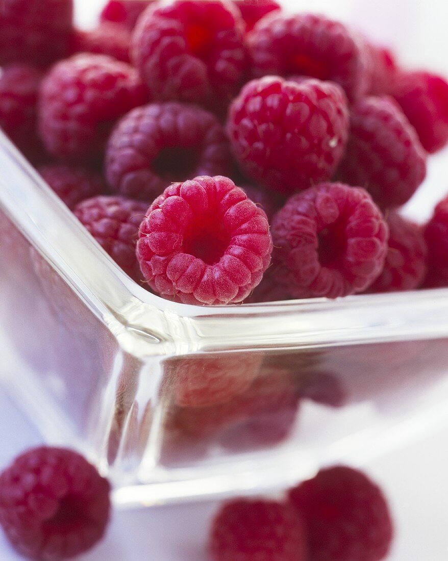 Fresh raspberries in glass dish