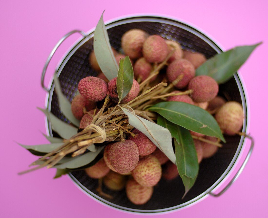 Lychees in a sieve