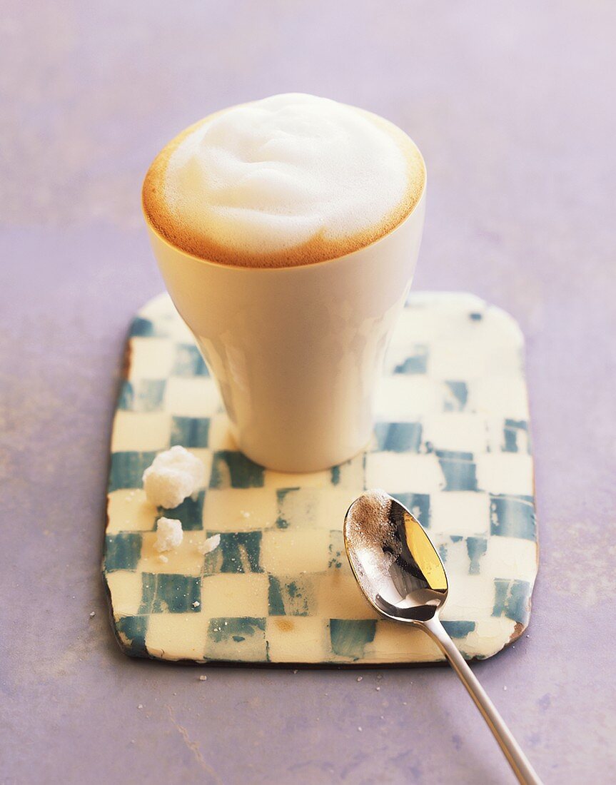 A beaker of latte macchiato