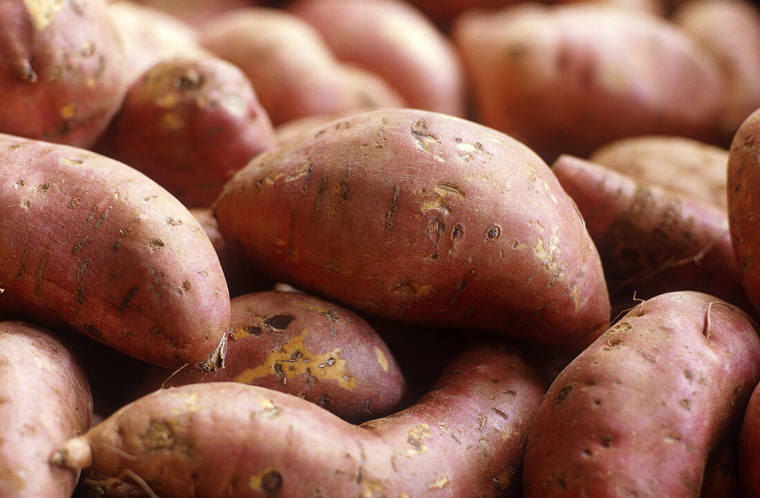 Sweet potatoes on a market stall