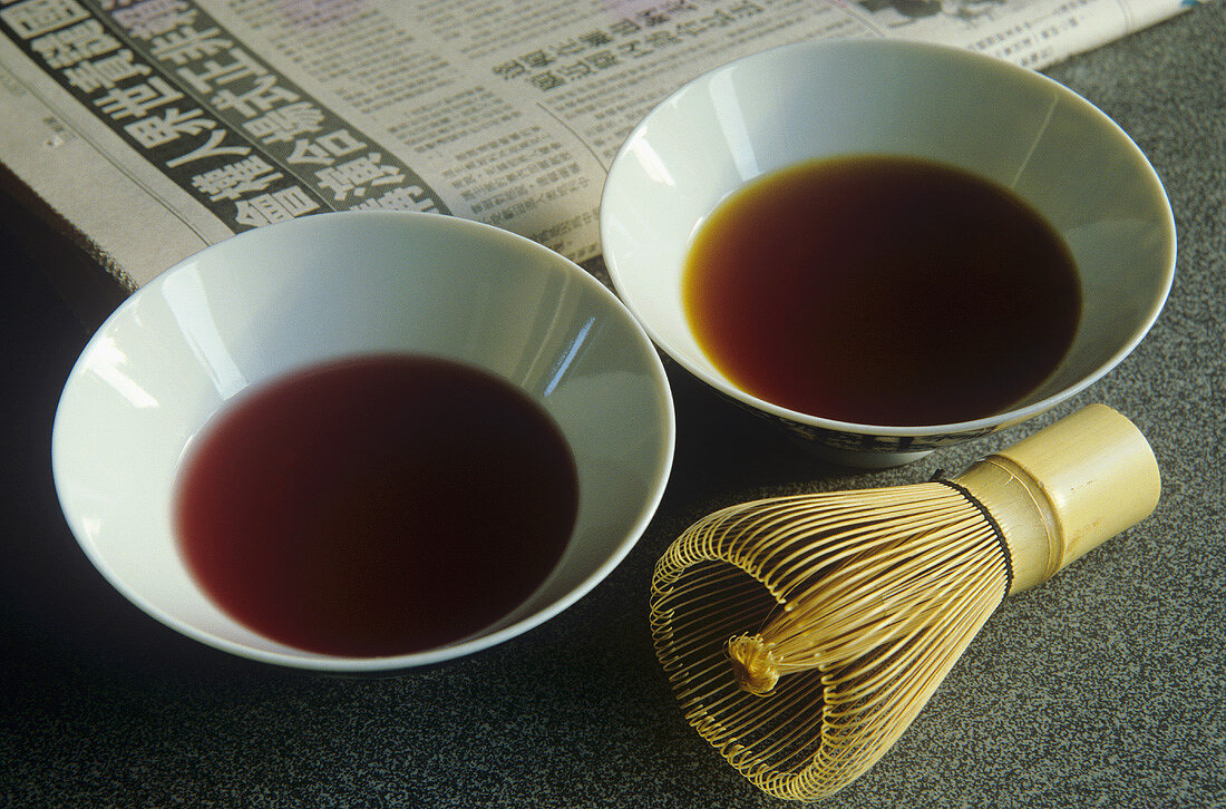 Tea in tea bowls with tea whisk