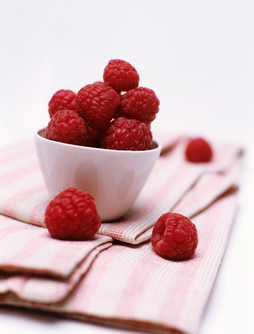Raspberries in a ceramic bowl (can also represent wine bouquet)