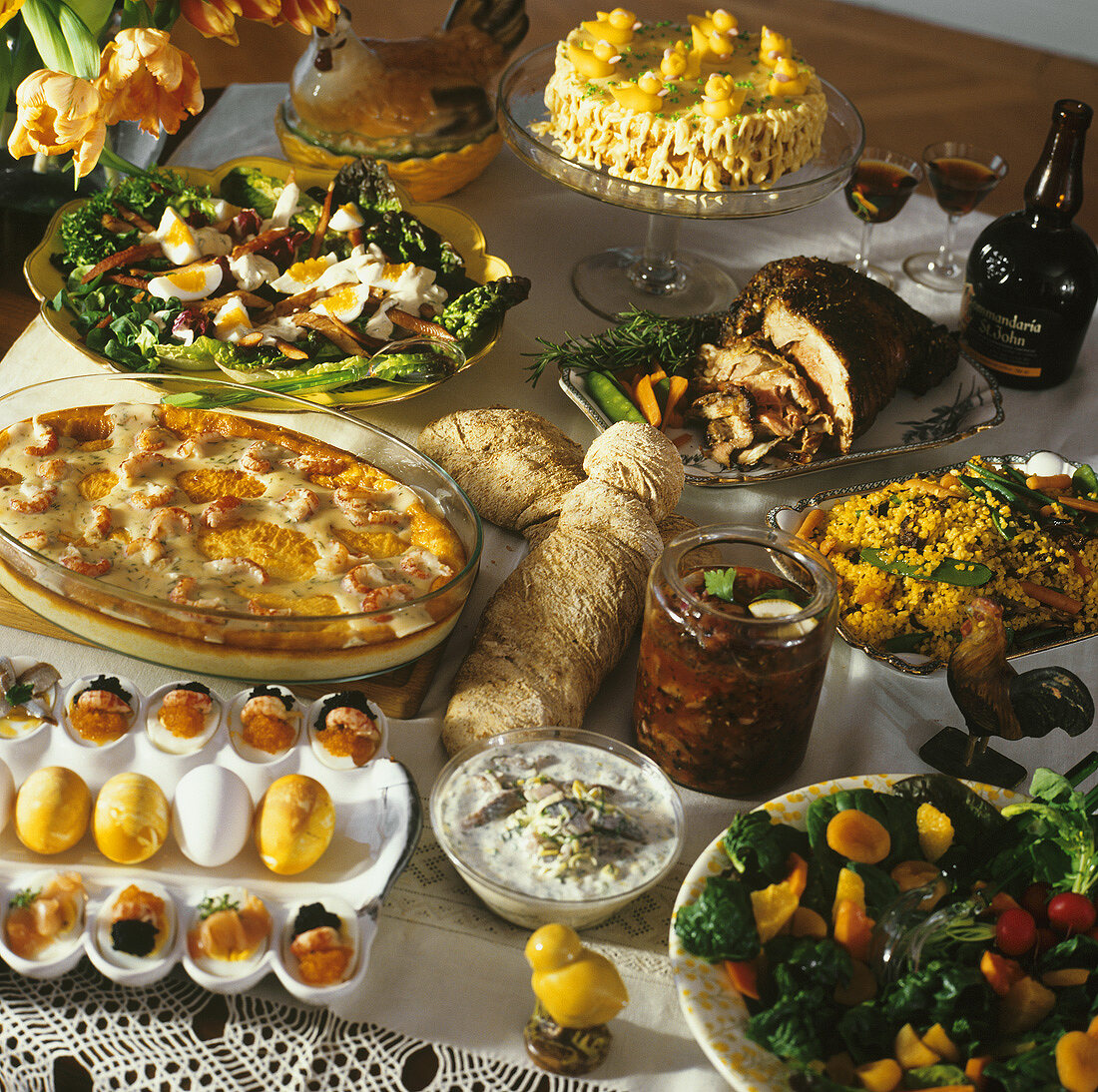 Easter buffet: salads, roast meat, gratin, eggs and cake