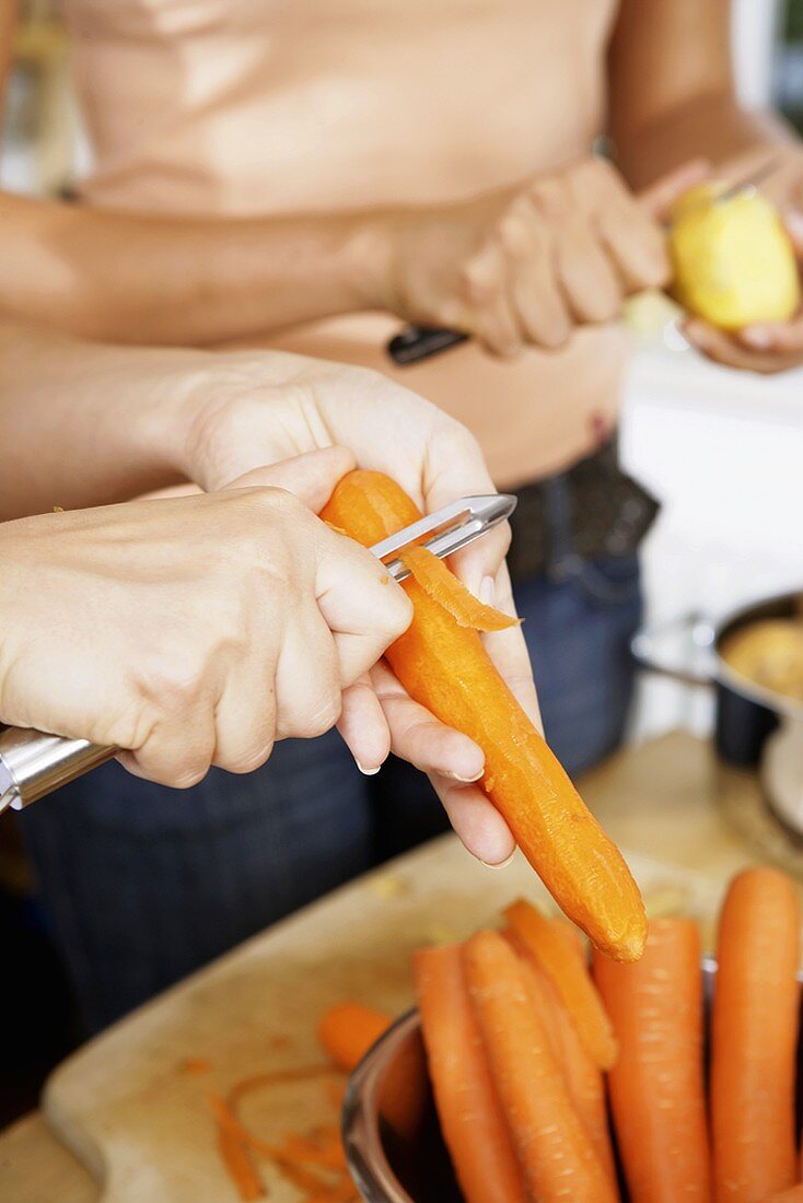 Peeling carrots and potatoes