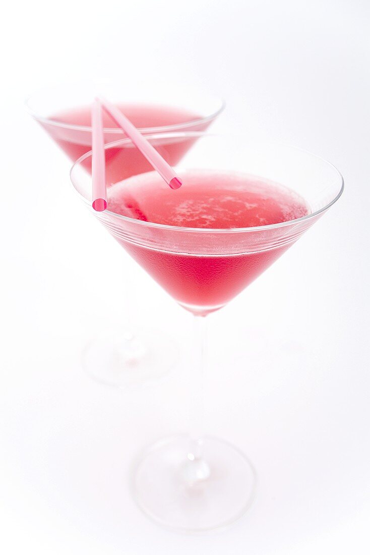 Two Cosmopolitan cocktails