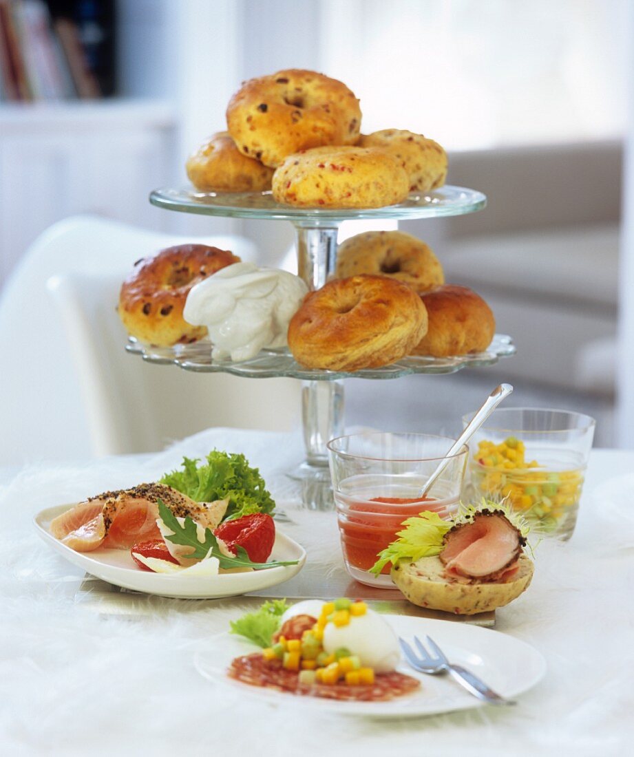 Sweet and savoury bagels on tiered stand, appetisers