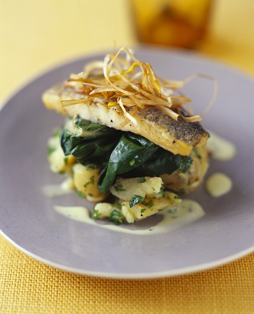 Zander fillet on spinach and potatoes