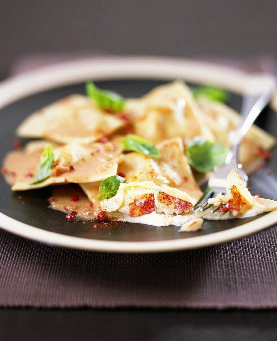 Lobster ravioli with tomato and cream sauce