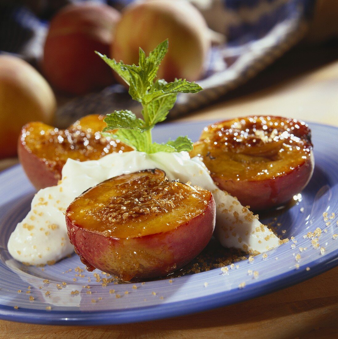 Grilled peach halves with brown sugar and cream