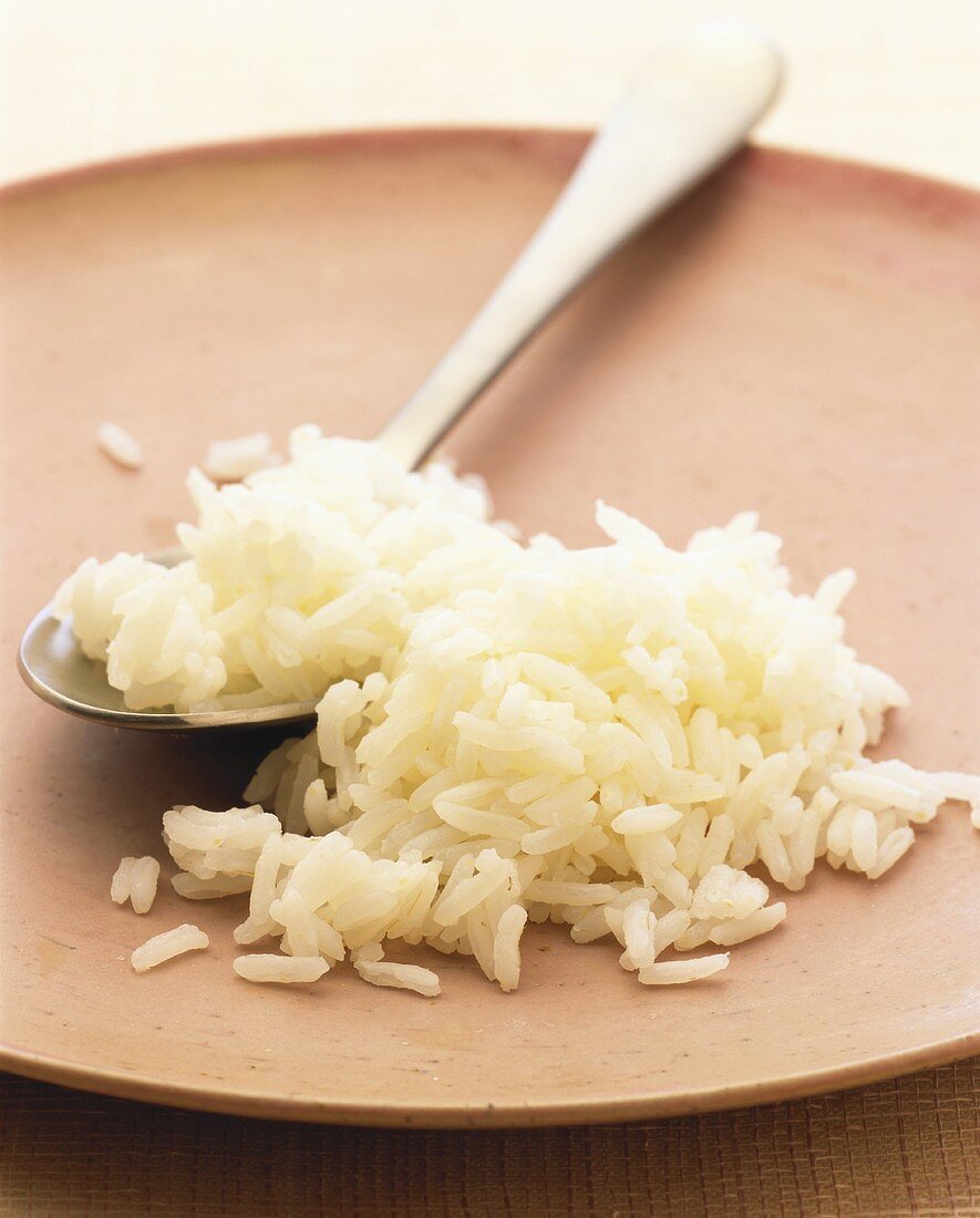 Cooked rice with spoon