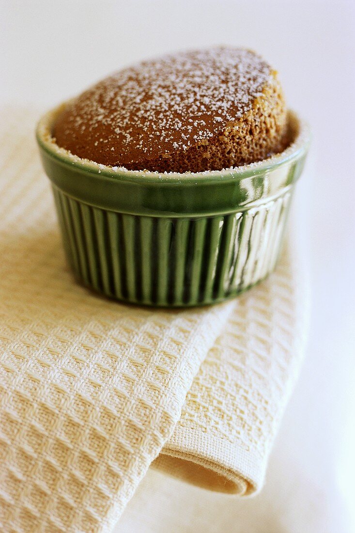 Chocolate pudding dusted with icing sugar