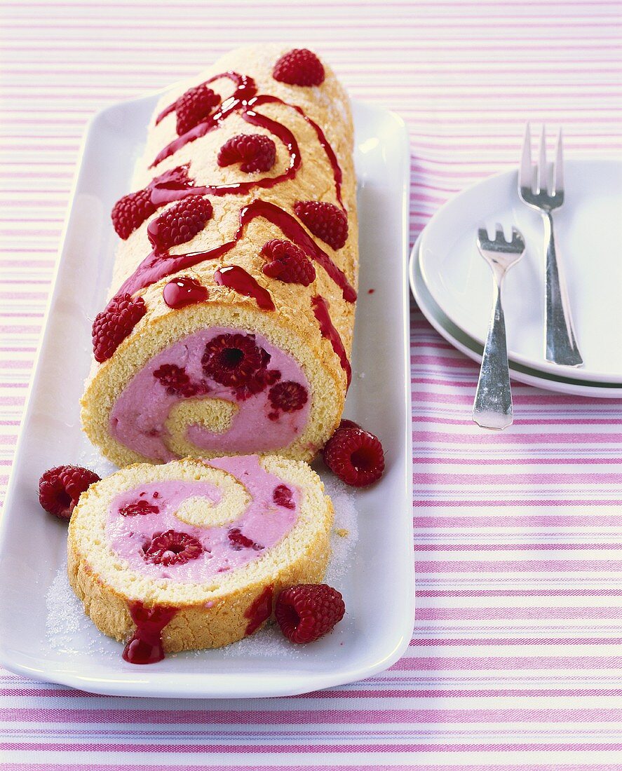 Raspberry roll, a piece cut