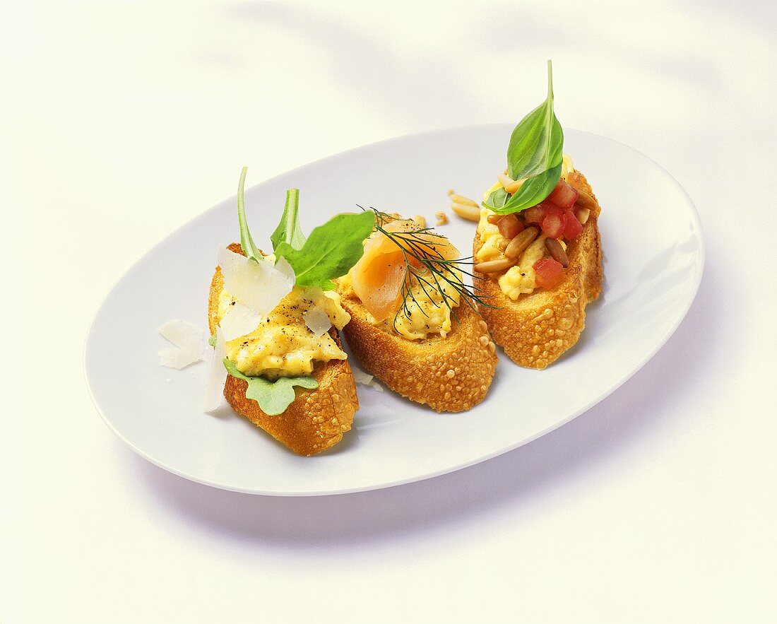 3 crostini with egg, salmon, tomatoes & oyster mushrooms