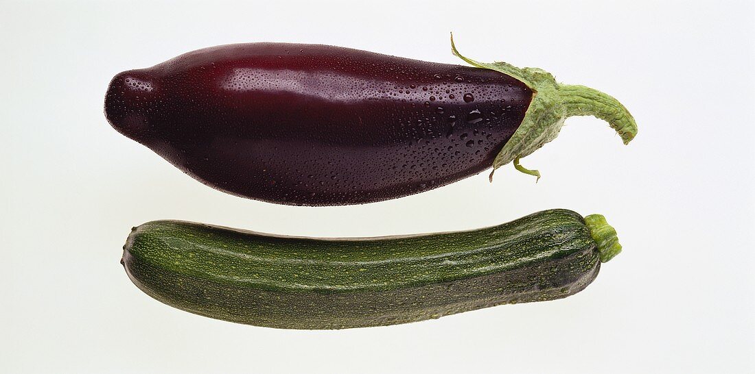 An aubergine and a courgette